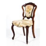 A Victorian rosewood upholstered hall chair.