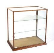 A Late Victorian mahogany framed glass shop display cabinet by Philip Josephs & Sons (London).