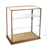 A Late Victorian mahogany framed glass shop display cabinet by Philip Josephs & Sons (London).