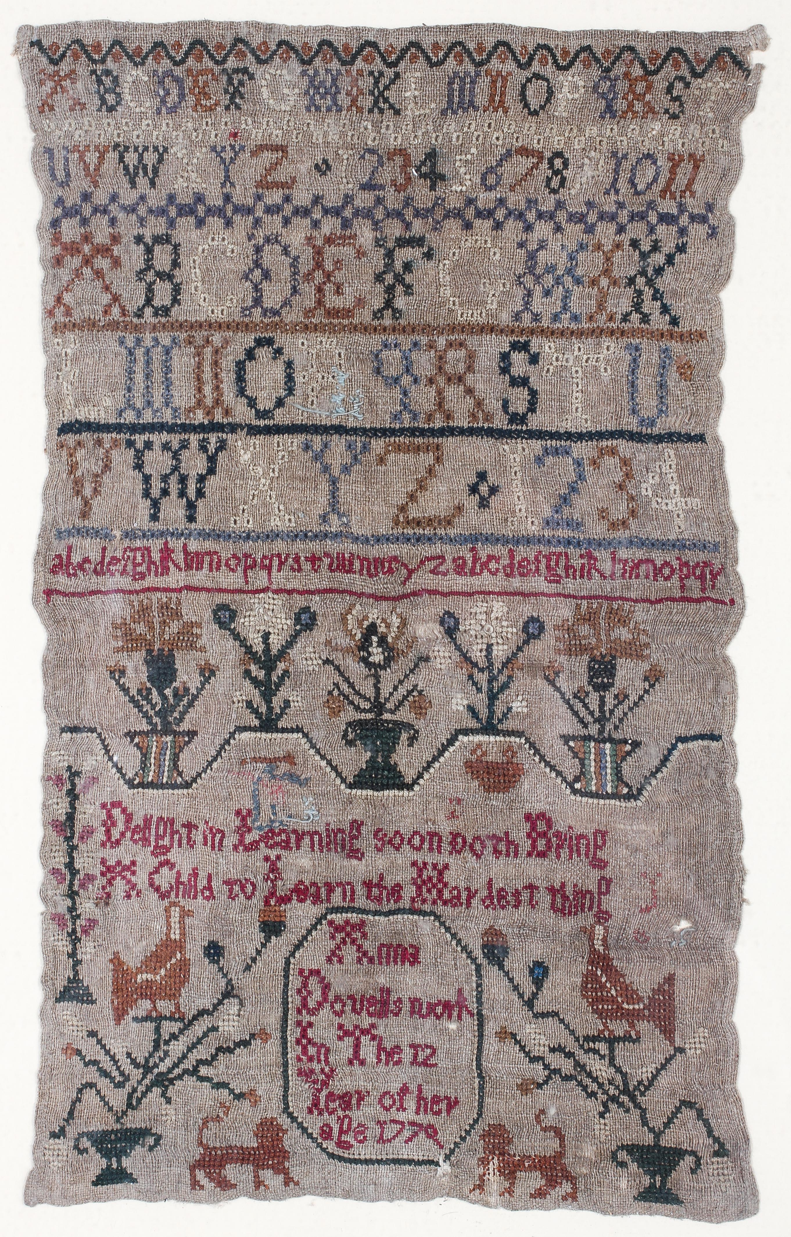 An 18th century needlework sampler.