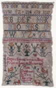 An 18th century needlework sampler.