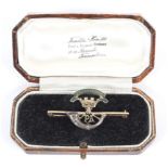 A 14ct gold Somerset Light Infantry 'Jellalabad' sweetheart brooch.
