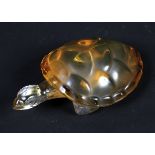 A Lalique amber tinted glass model of a turtle.