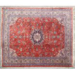 A 20th century wool Persian style carpet.