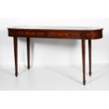 An Edwardian mahogany D-end serving table.