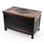 An 18th century small oak coffer.