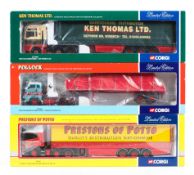 Three boxed Corgi Limited Edition 1:50 scale diecast trucks and trailers.