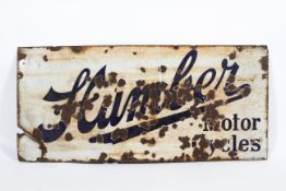 A 'Humber Motor Cycles' enamel advertising sign.