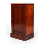 A Victorian mahogany single door bedside cabinet.