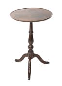 A Victorian mahogany dish top tripod occasional table.