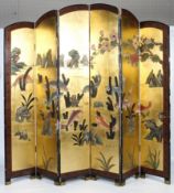 A Chinese lacquered six-fold screen.