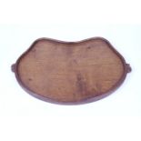An oak kidney shaped Mouseman tray. with two mice handles L47cm.