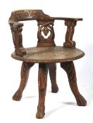 A carved oak swivel chair, late 19th/early 20th century.