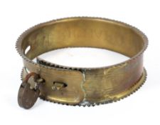 A 19th century engraved brass dog collar. Inscribed RICHARD MOSS.