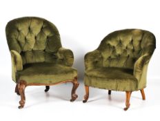 A pair of near matched late Victorian his and hers button back elbow tub chairs.