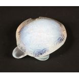 A Lalique opalescent glass model of a tortoise.