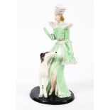 A Crown Devon Art Deco figure of a lady with a greyhound.