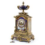 A late 19th century Sevres-style gilt-metal mounted 8-day mantel clock.