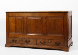 An early 19th century oak mule chest.