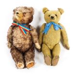 Two early 20th century teddy bears.