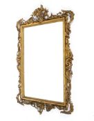 A Georgian style giltwood and gesso overmantel mirror.