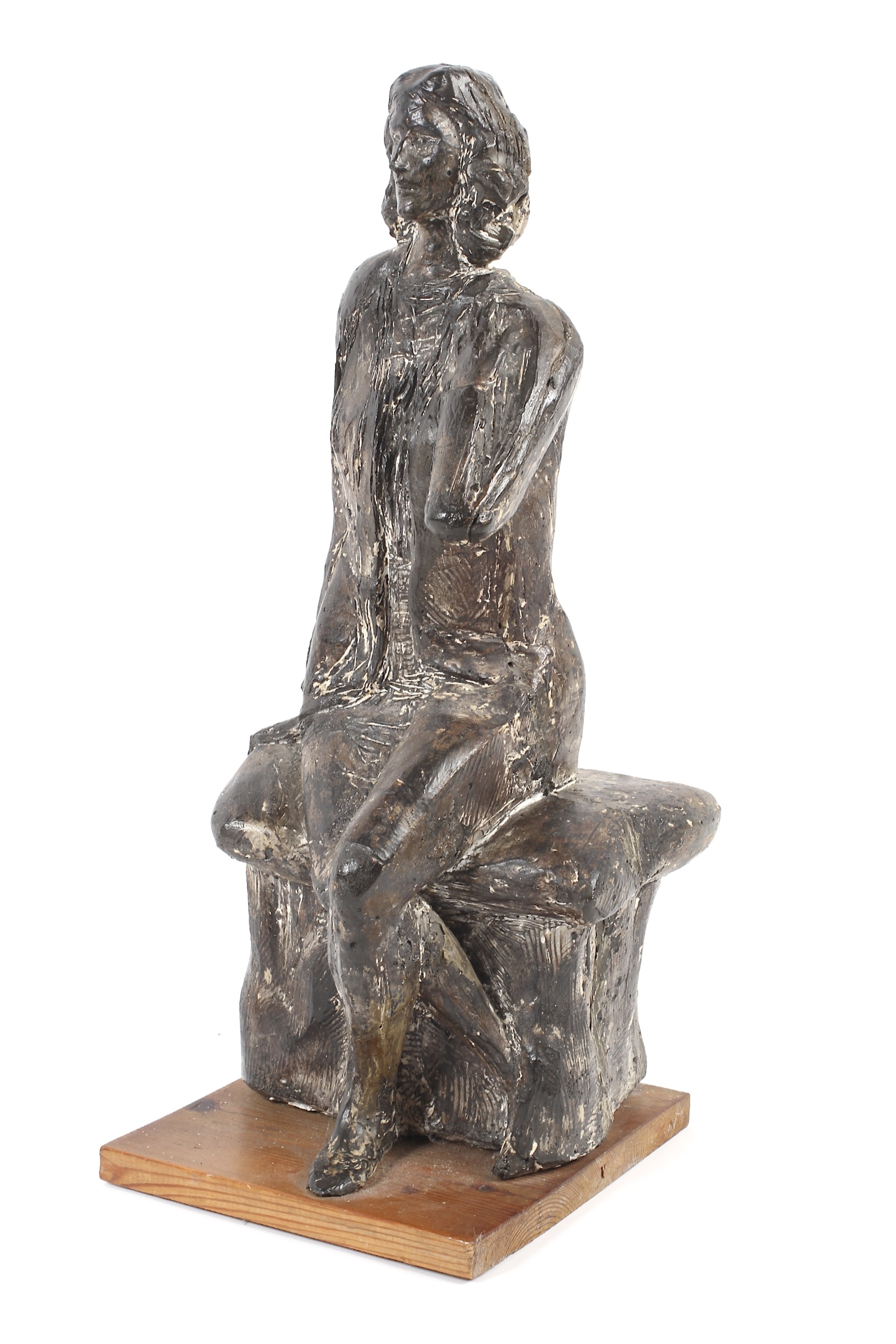 A 20th century sculpture of a seated lady.