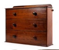 A Victorian mahogany hanging chest of drawers With three drawers with turned wooden handles,