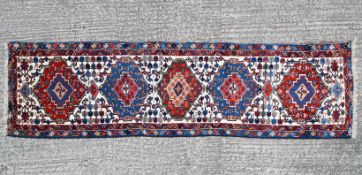 A small Tabriz runner.