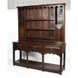 An 18th/19th century oak open dresser.