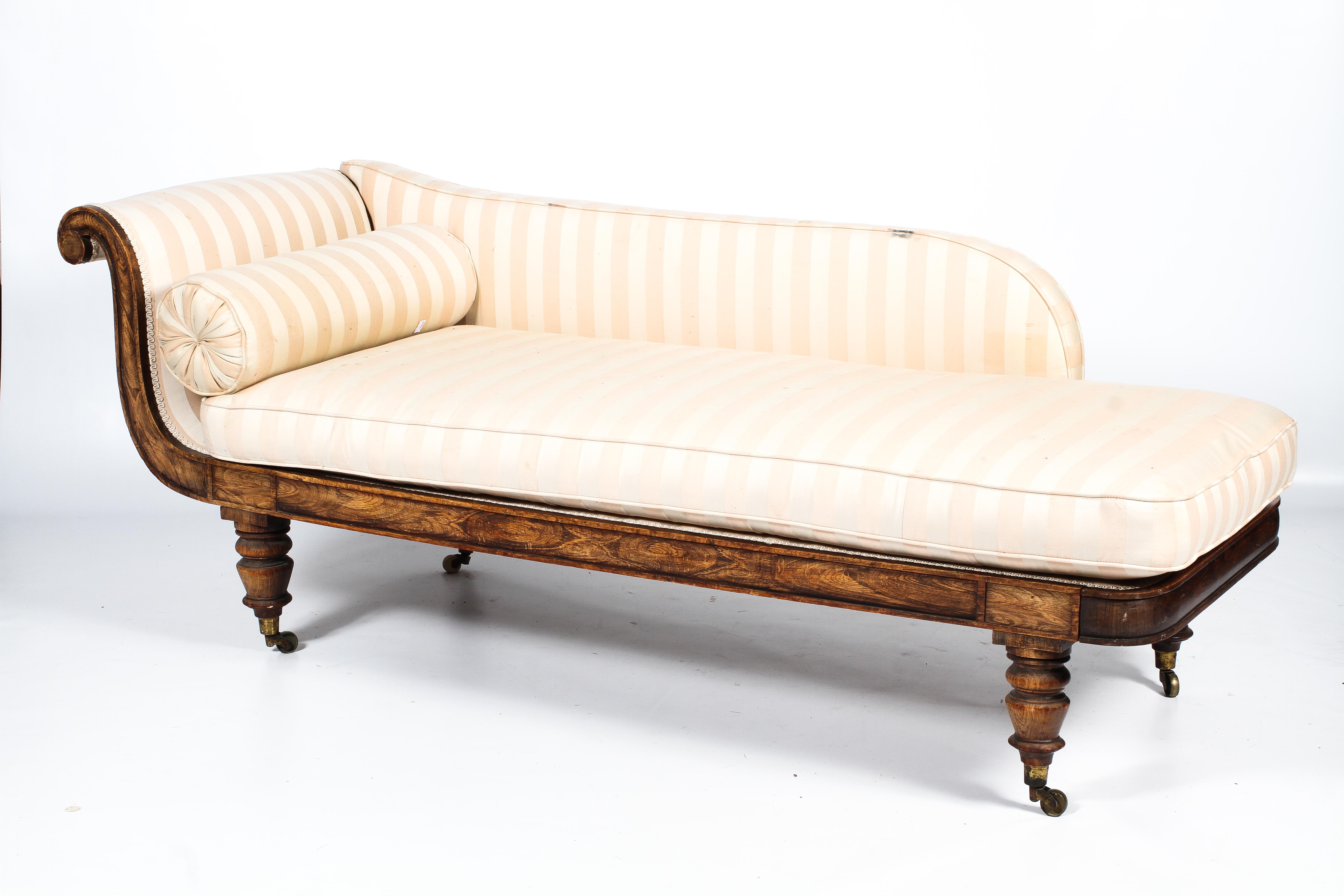 A Regency style rosewood framed upholstered day bed.