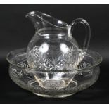 A late 19th century cut glass water ewer and basin.