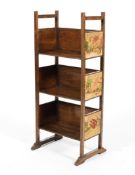 An Arts and Crafts free standing open bookcase.