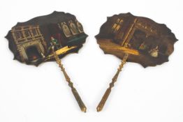 A pair of 19th century lacquered, painted and gilt wooden face fire screens.