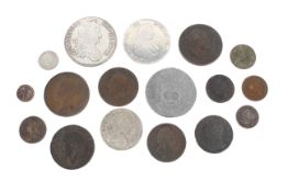 A selection of British and continental coins.