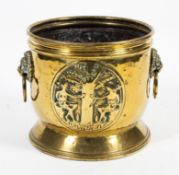 A 19th century brass coal bucket.