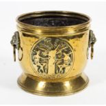 A 19th century brass coal bucket.