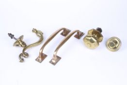 A late 19th early 20th century door knocker set.