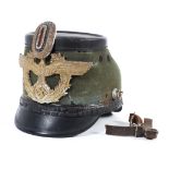 A German WWII Third Reich German military police Shako helmet.