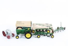 Three Ertl 1:16 scale diecast models.