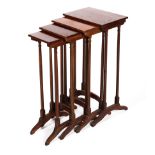 A nest of four Regency style mahogany "Quartetto" tables.