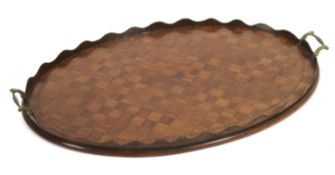 An Edwardian marquetry inlaid serving tray.