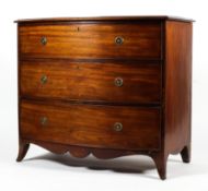 A 19th century bow fronted chest of drawers.