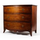 A 19th century bow fronted chest of drawers.