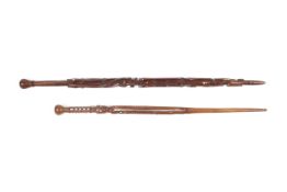 Two Solomon Islands walking sticks.