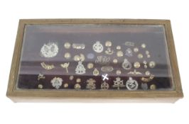 A collection of military badges.