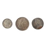Three coins: 1834 shilling; 1757 sixpence;