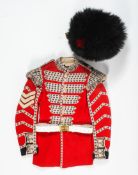A Coldstream Guards Drummer's jacket and bearskin hat.