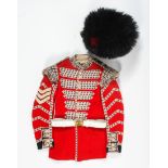 A Coldstream Guards Drummer's jacket and bearskin hat.