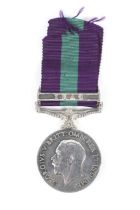 A George V General Service medal with Iraq clasp, awarded to 69 HVLDR Mustghan Gul, 3-124,