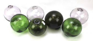 A collection of glass fishing floats.